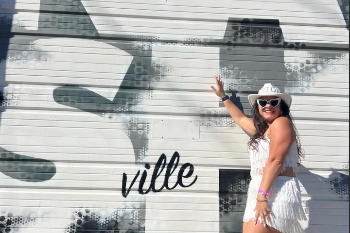 a person walking down a sidewalk