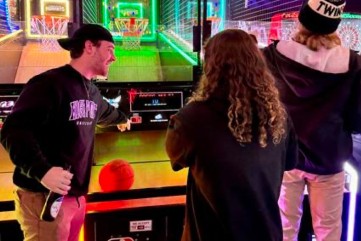 a group of people standing in a room